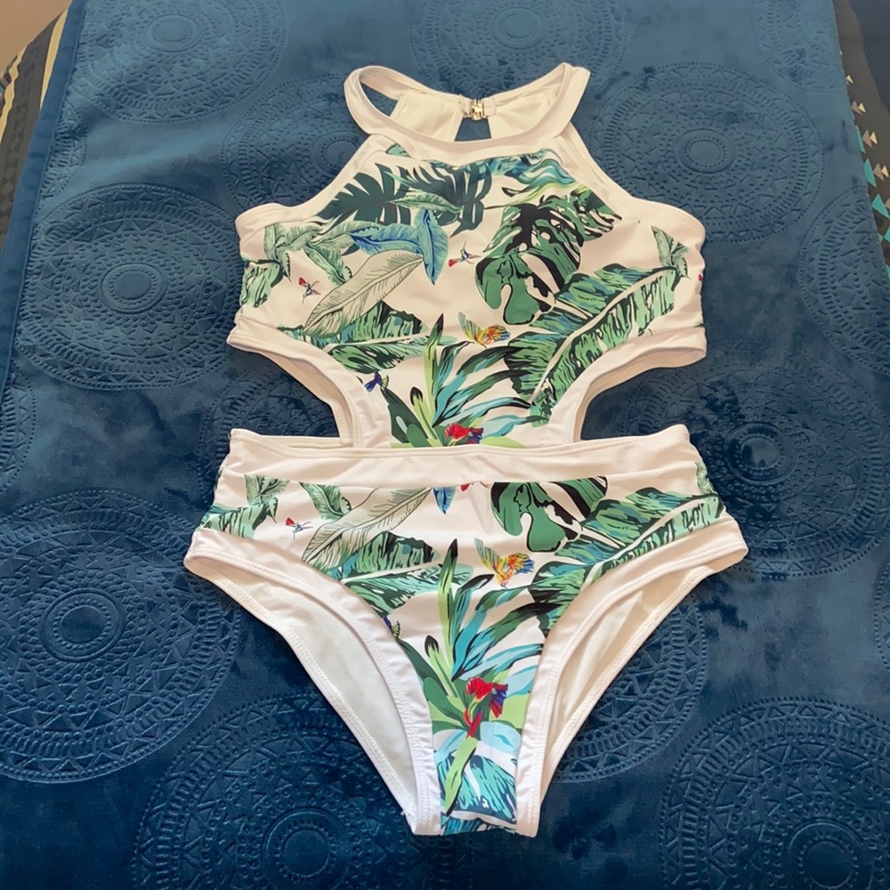 One price swim suit with cut outs